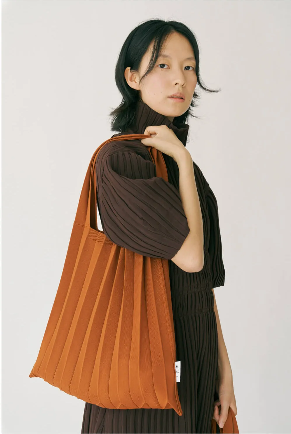 Knit Pleated Shoulder Bag made from Recycled Ocean Plastic - Mulberry