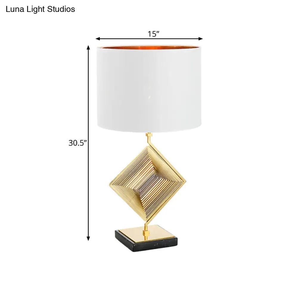 Modern Gold Metal Pyramid Bedside Lamp with White Fabric Shade