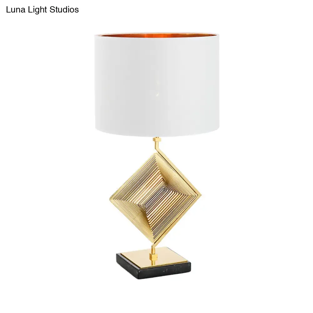 Modern Gold Metal Pyramid Bedside Lamp with White Fabric Shade