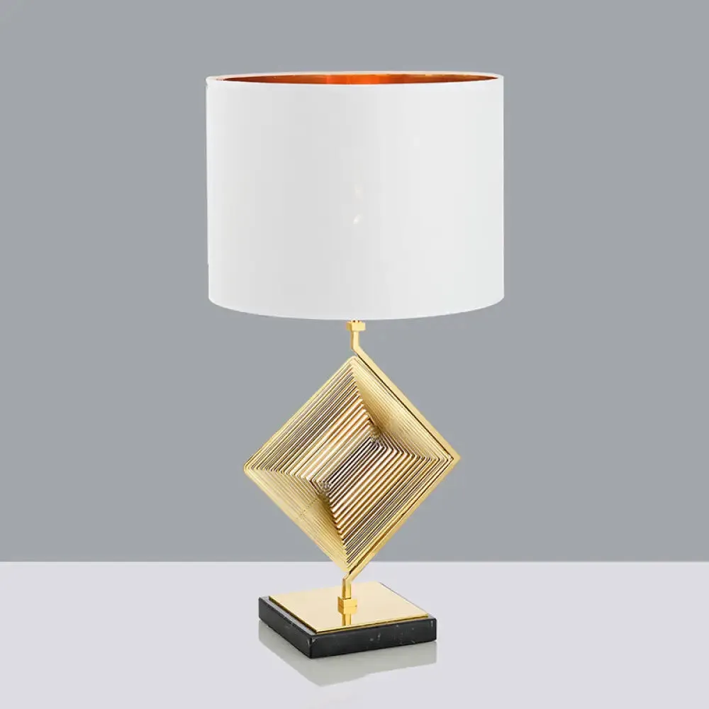 Modern Gold Metal Pyramid Bedside Lamp with White Fabric Shade