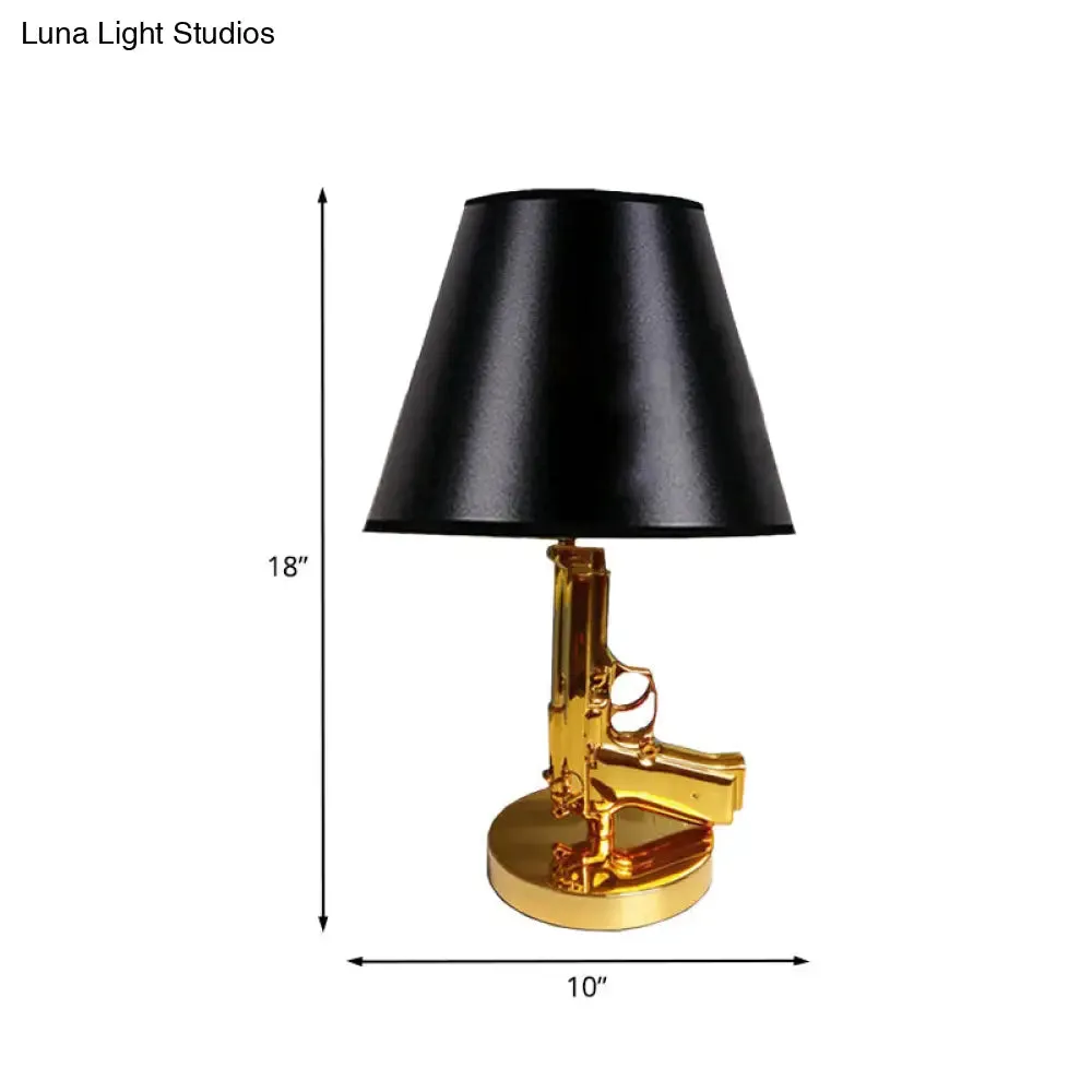 Modernist Black Barrel Shade Table Light with Gold Gun-Shaped Body - 1-Head Fabric Desk Lamp